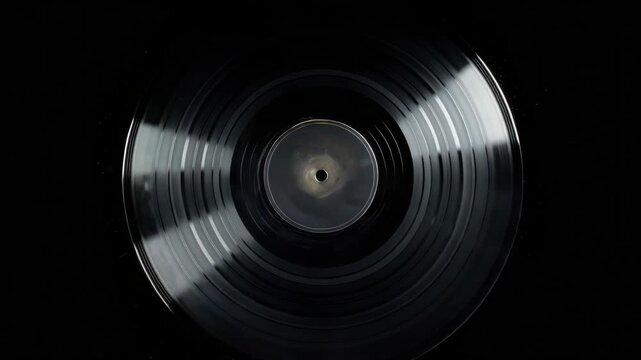 A single vinyl record on a turntable