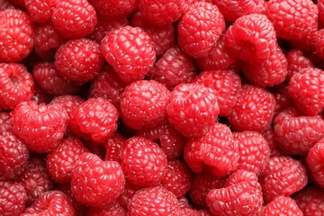 Fresh ripe raspberries as background, top view