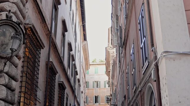Charming Roman Building With Traditional Shuttered Windows And Historic Facade 