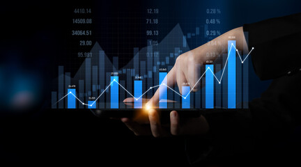 A professional hand interacts with digital data visualization on a tablet screen, showcasing financial growth and strategic insights through modern analytics techniques. Scalp
