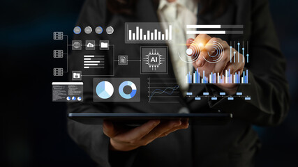 A business professional utilizes a tablet to engage with digital analytics featuring various graphs, charts, and data visualizations to enhance decision-making processes. Gantry