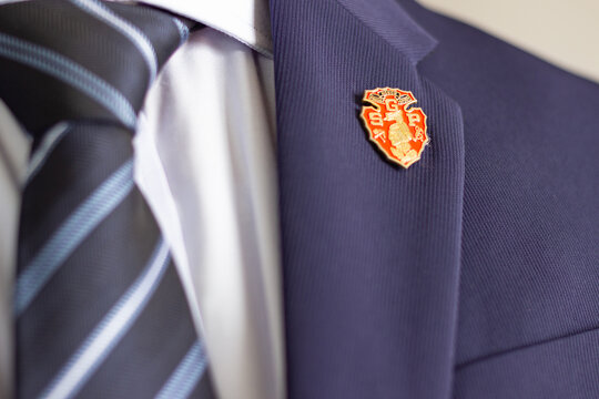 Business suit with South Grand Prairie High School lapel pin