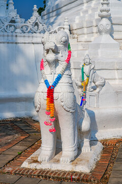 White statue of a chinthe in the Wat Phra That Doi Kongmu hilltop temple in Mae Hong Son, Northern Thailand
