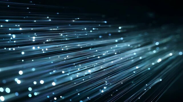 Blue fiber optic strands emit glowing particles, illustrating fast data transfer and advanced connectivity. The digital abstract background evokes innovation and modern technology