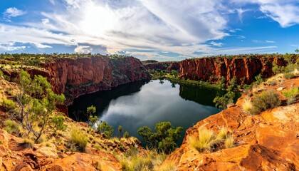 Panoramic landscape view of red rock canyon cliffs reflecting on calm water pool under blue sky. Nature concept