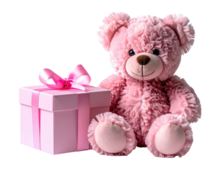 Plush pink bear sitting next to a gift box with a pink bow