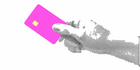 A pink credit card partially emerging from a grayscale abstract shape