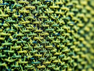 Close-up of a rough, nubby tweed weave, classic texture,  texture,  neutral