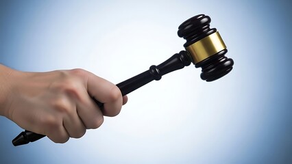 Judge gavel being held by hand