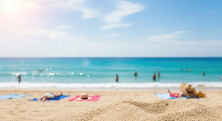 Fototapeta premium A beach scene with people and a sun hat on the sand.