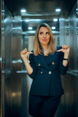 Self Important CEO Pointing to herself Entering an Elevator. Presumptuous privileged egocentric businesswoman feeling entitled 