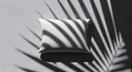 Pillow with Palm Leaf Shadows on Wall