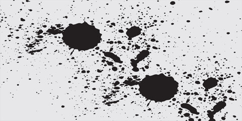 Abstract grunge texture with black speckles and scattered dots on a white background, great for artistic designs.