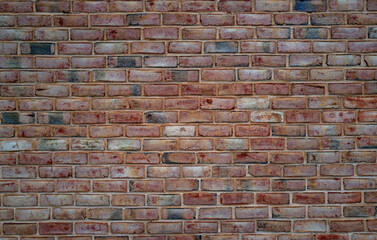 Naklejka premium Brick wall background, bricks texture design. Textured background of brick wall. Clinker brick. Wall from brick background. Grunge, wall pattern. Bricks texture.