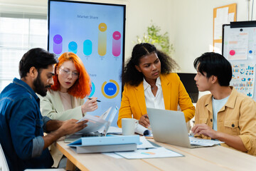 Group of young creative multiethnic business team brain storm meeting presentation,discussing roadmap to product launch, planning,strategy,new business development,working with new startup project