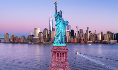 New York skyline at Statue of Liberty. American Independence Day. NYC with World Trade Center and...