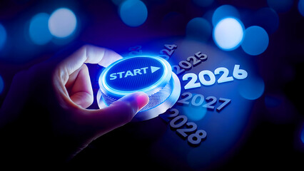 Blue glowing start button with futuristic design representing technology, innovation, digital transformation, and strategic planning for 2026.
