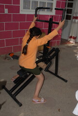 Assembling home gym fitness equipment using hand tools and workout demonstration