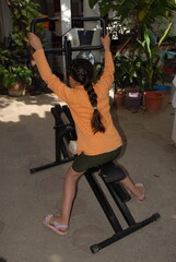 Assembling home gym fitness equipment using hand tools and workout demonstration