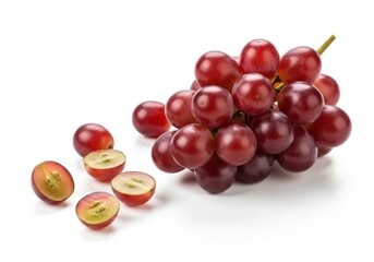 Fresh red grapes bunch and sliced halves isolated on white background