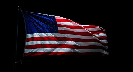 American Flag Waving Proudly in the Darkness of Night.