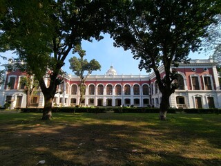Grand Palace View Framed by Arching Trees