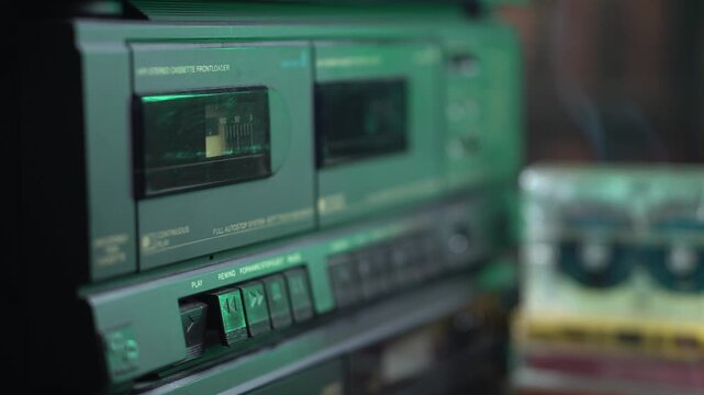 Inserting and Starting Playback of Audio Cassette Tape in Doble Deck Player Recorder From 1980's