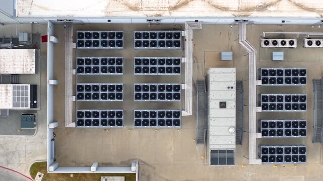 Top down view of cooling towers, chillers, pipe lines and back up generators of large Data centers.