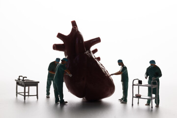 Heart Surgery Concept with Medical Team and Anatomical Model