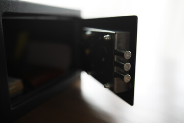 money in a residential safe close-up photo. Deposit in cash. Russian rubles are in the safe