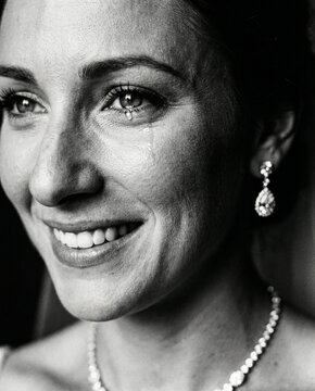 Black and white emotional portrait of bride crying happy tears