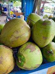 Vibrant Green Coconuts Offering Tropical Hydration and Natural Sweetness Closeup