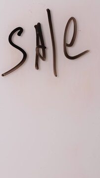 Learn how to write and erase markdown sale promotions quickly and simply. This clip shows the steps to creatively present deals and savings on any surface.