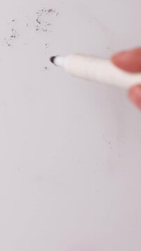 A hand cleans a white surface. After cleaning, a hand writes percentages on the surface with a marker. Act fast and take advantage of this great markdown