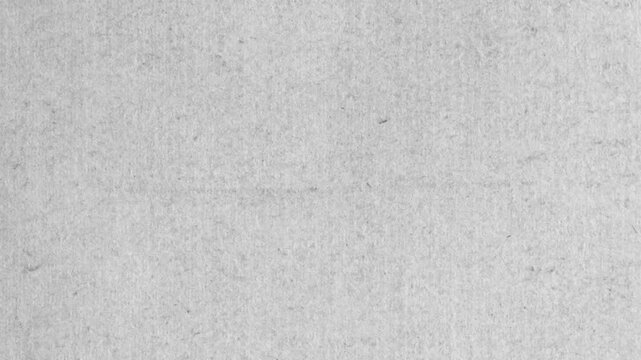 Grunge Paper Texture Loop. A distressed, black and white animation of flickering old documents and text. grungy textures, grungy backgrounds and copy space 4K stock video