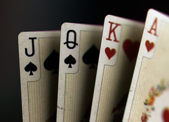 Vintage Royal Playing Cards Closeup Dark Background