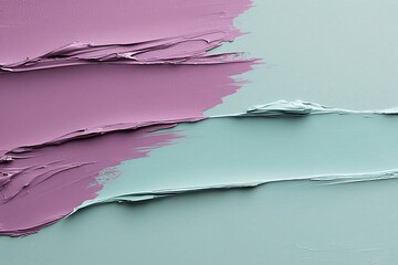 Abstract texture of purple and green paint with smooth brush strokes on canvas surface