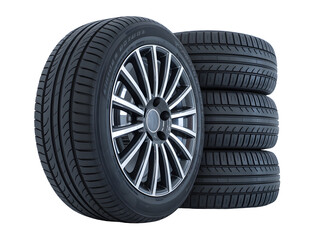 Stack of four new high performance automotive tires with alloy wheels isolated on a black background
