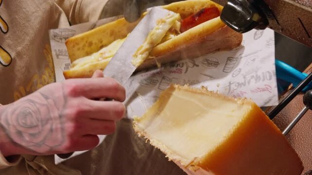 Traditional cheese raclette. Food culture in France. A warm and inviting raclette stand melting cheese over fresh bread, filling the Christmas market with cozy aromas and festive winter charm