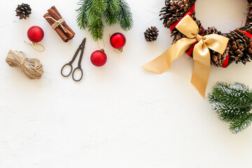 Christmas wreath with accessories, top view. New Year DIY decoration