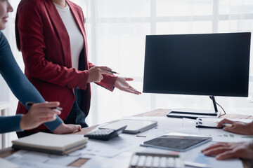 Business professionals discussing data during a corporate meeting