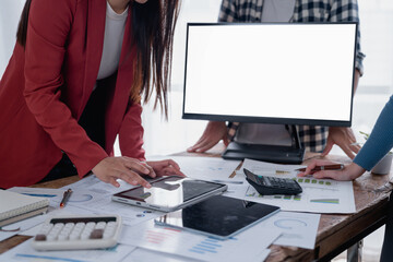 Business team analyzing financial data at office meeting