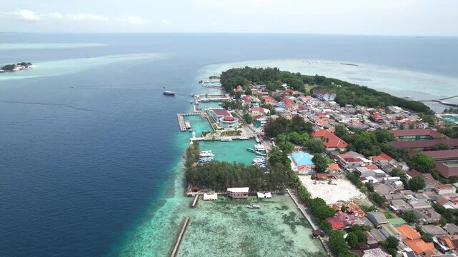 Coastal area of Pulau Pramuka in the Thousand Islands, featuring tropical shoreline, clear sea, and island ecosystem.
