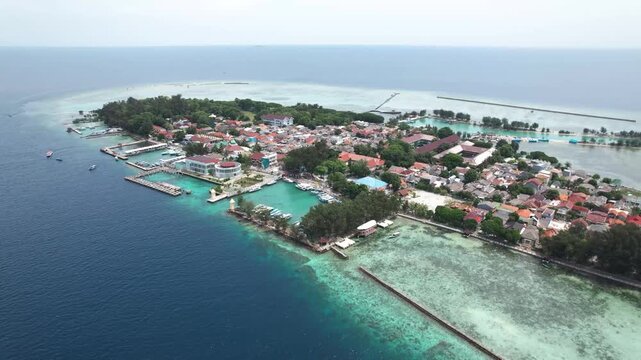 Coastal area of Pulau Pramuka in the Thousand Islands, featuring tropical shoreline, clear sea, and island ecosystem.