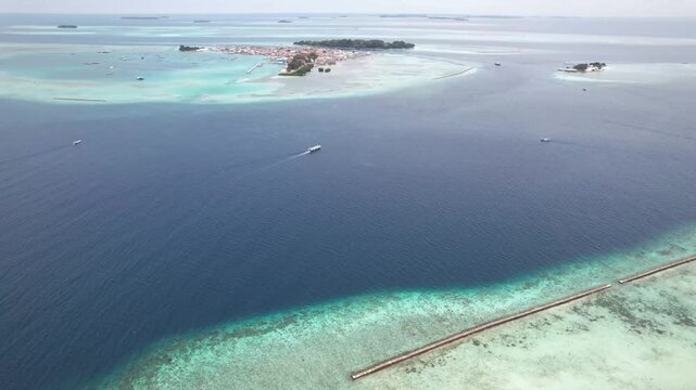 Coastal area of Pulau Pramuka in the Thousand Islands, featuring tropical shoreline, clear sea, and island ecosystem.