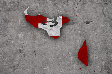 Karte und Fahne von Tonga auf verwittertem Beton