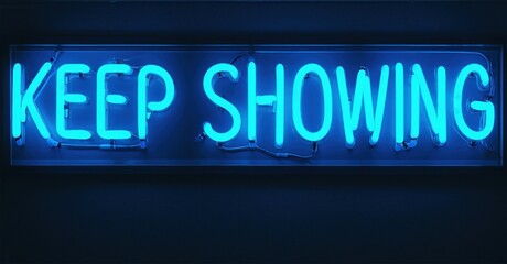 Obraz premium Bright neon sign displays text KEEP SHOWING. Dark background emphasizes glowing blue illumination. Simple, direct message.