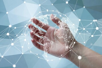 Human hand holding a glowing digital wireframe globe with an intricate global network of lines and dots on an abstract blue technological background.