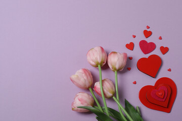 Valentine's Day banner with gift boxes surrounded by red hearts on a colorful background. Perfect for romantic and festive events.
