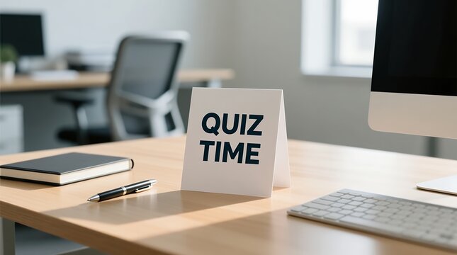 Modern office desk setup with quiz time sign for workplace learning